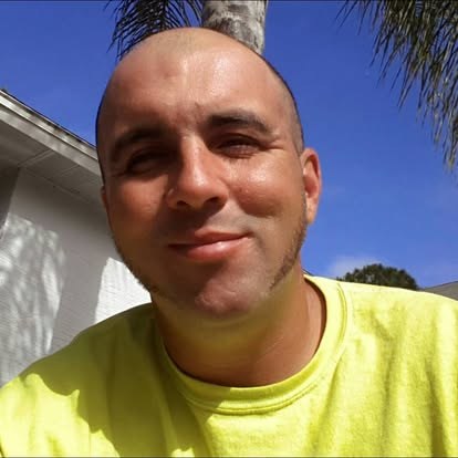 James Margerelli, owner of Elvis Tree Climber Extraordinaire, tree service in Palm Coast, FL